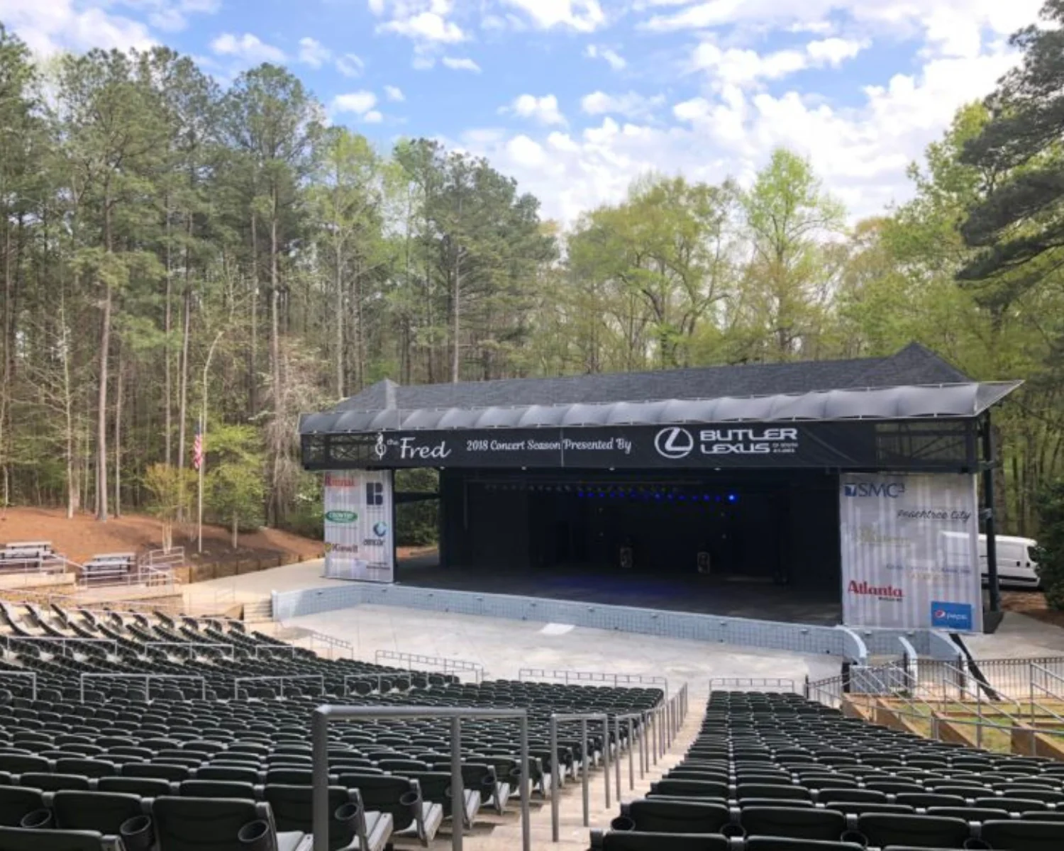 Outdoor stage venue with chairs