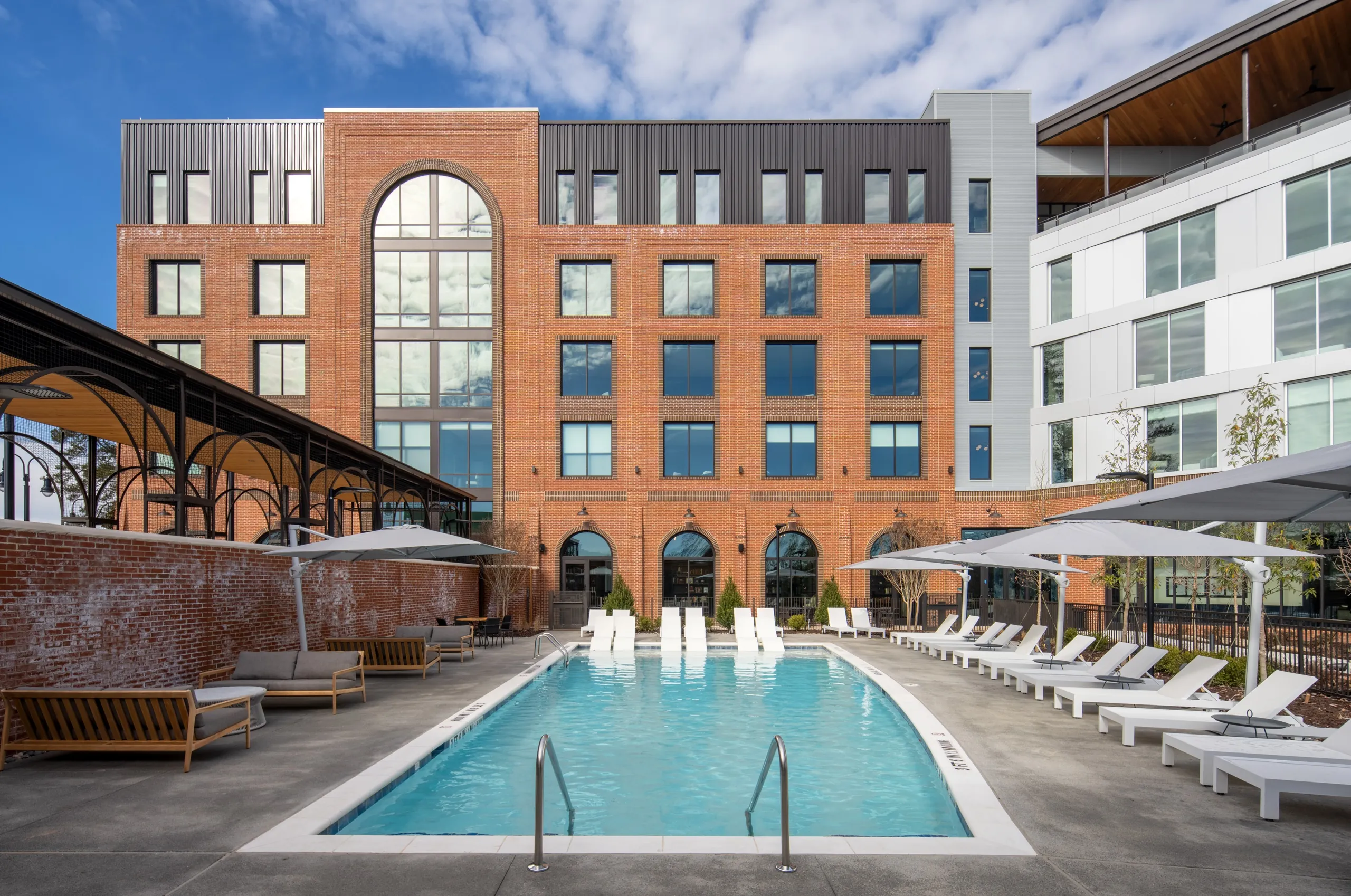 A pool in front of a building